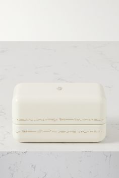 a white box sitting on top of a counter