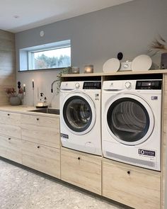 a washer and dryer in a very large room