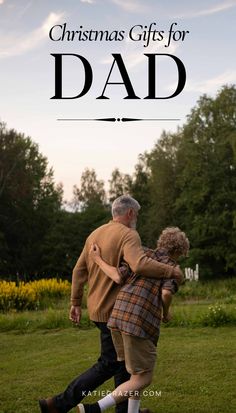 an older man and woman are walking in the grass with text overlay that reads christmas gifts for dad