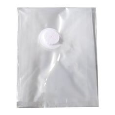 a white plastic bag with a button on it