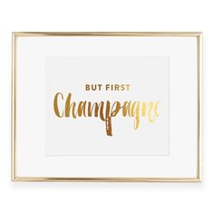 a white and gold framed print with the words but first champagne