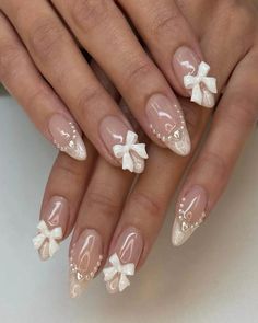 These Spring 2024 Nail Art Trends Are Inspiring Us to Do the Most With Our Manicure | Allure Bow Nail Designs, Easy Nails, Girly Acrylic Nails, Fake Nails With Glue, Pearl Nails, Stick On Nails, Nail Charms, Nail Art Hacks, Nail Accessories