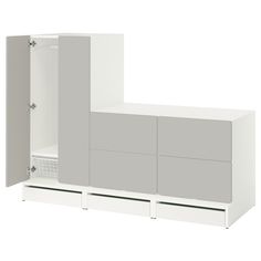 a white cabinet with two doors and drawers