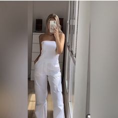 Nwot Tag Zara Long Cargo Jumpsuit Size Xs Color White Never Used, I'm Selling It Because It's A Little Long For Me. Strapless Long Jumpsuit With Straight Neckline. Side Pockets And Patch Pocket At Leg. Side Hidden In-Seam Zip Closure. Cotton. White Jumpsuit Outfit, Cargo Jumpsuit, Long Jumpsuit, Outfit Zara, Zara Jumpsuit, Jumpsuit Outfit, White Jumpsuit, Zara White, Long Jumpsuits