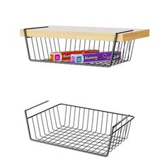 two metal baskets are hanging on the wall and one has a book shelf above it