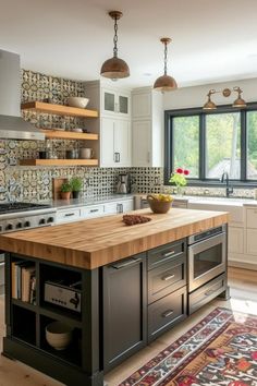 a large kitchen with an island in the middle and lots of counter space around it