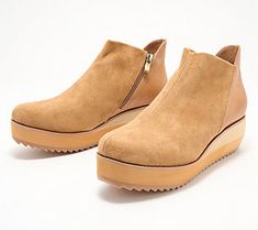 Experience all-day comfort in these wedge ankle boots. This sporty style adds the perfect finishing touch to casual ensembles. From Antelope. Casual Brown High-top Wedge Boots, Casual Suede Wedge Boots, Casual Suede Ankle-high Wedge Boots, Casual Ankle-high Suede Wedge Boots, Casual Ankle-high Platform Wedge Boots, Casual Suede Platform Wedge Boots, Wedge Ankle Boots, Leather Wedges, Sporty Style