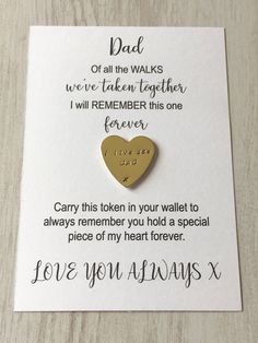 a card with a gold heart on it that says, dad of all the walks we've taken together will remember this one forever