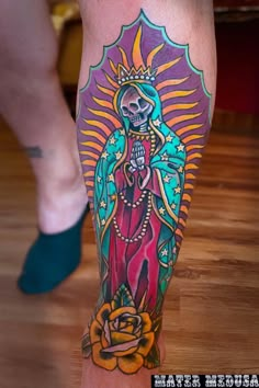 a person with a tattoo on their leg