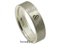 a fingerprint wedding ring is shown on a white background