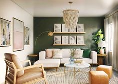 a living room filled with lots of furniture next to a wall covered in framed pictures