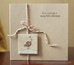 a card with a bird on it and a string attached to the front of it