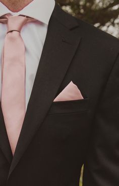 The Sam Pocket Square is a stylish addition to a matching Neck or Bow Tie and will be your Mumu mans best friend! Get ready to sip and spin all night under the stars! Whether he's a guest or a groomsmen, now you both can be in Mu when your watching an "I do!"This color was created to compliment our Rose Gold dresses, due to the varying fabrics, there may be slight shading discrepancies between the ties and dresses Black Tux With Pink Bow Tie, Dusty Rose Tuxedo, Groomsmen Attire Pink Tie, Groomsmen Attire Dusty Rose, Black Suit Pink Tie Wedding, Tuxedo With Pink Tie, Pink Tie Black Suit, Rose Gold Groomsmen, Dusty Rose And Black Wedding