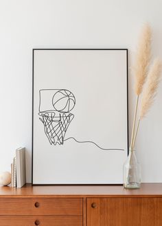 a black and white drawing of a basketball hoop on a wall next to a dresser