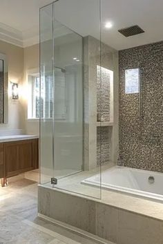 Explore 17 stylish tips for upgrading your bathroom with wet room designs and space-saving storage solutions. Features an attractive array of tiles for your dream wet room.