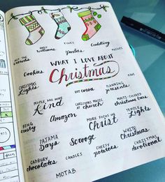 an open notebook with christmas writing on it