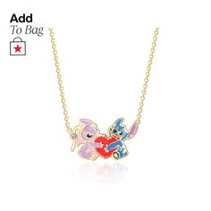 a necklace with two cartoon characters on it