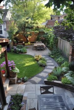 an outdoor patio and garden area in a backyard