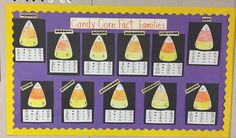 a bulletin board with candy corn fact families written on it and numbered by the numbers