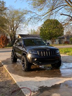 the jeep is parked on the side of the road