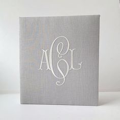 the monogrammed canvas is on display