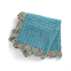 two blue crocheted dishcloths with colorful sprinkles on them