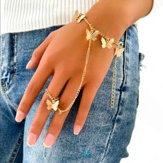 Gold Butterfly Hand Ring & Bracelet For Sale! This Bracelet Is So Cute. It Is More Like A Hand Decoration! Very Exotic, And So In Style. It Is New And From My Boutique! The Bracelet Part Is On An Adjustable Gold Chain, So It Can Be Fit To Your Desired Length. The Ring Part Is Just One Size, That Will Fit Any Size Finger. Such A Cute Bracelet To Add To Your Jewelry Collection! Aesthetic Hand Accessories, Cute Butterfly Jewelry, Grad Jewelry Gold, Butterfly Accessories Jewelry, Hand Accessories Aesthetic, Grad Jewelry, Finger Ring Bracelet, Fantasy Bracelet, 70s Butterfly