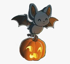 a bat sitting on top of a pumpkin