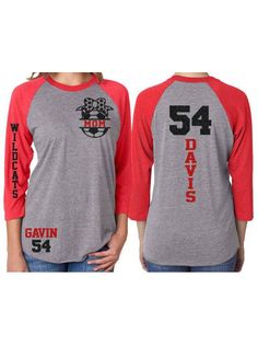 a women's gray and red baseball shirt with the number 54 in black on it