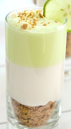 a dessert in a glass with a lime slice on top