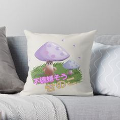 an image of a mushroom on the ground with japanese characters in it throw pillow cover