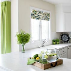 the kitchen counter is clean and ready to be used as a serving tray for limeades