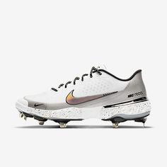 the nike zoom vapor golf shoe is shown in white and silver with gold accents on the sole