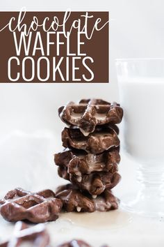 chocolate waffle cookies stacked on top of each other next to a glass of milk