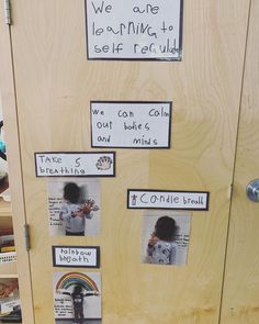 a door decorated with pictures and magnets for children to write their name on it