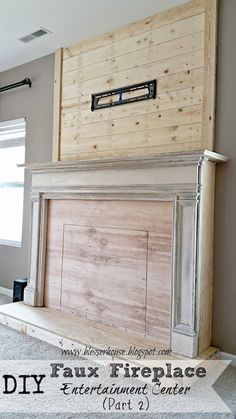 an old fireplace with wood paneling on top and the words diy faux fireplace entertainment center part 2