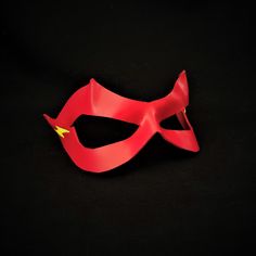 DESCRIPTIONMove at Super-Speed as The Flash! Master the Speed Force and Cosplay Barry Allen, Wally West, or Jay Garrick wearing this lightweight red leather mask - with yellow lightning bolt on the side - for your Marvel superhero cosplay at Comicon, DC fandom convention, or Halloween. Any color. Waterproofed leather, glossy or matte finish, & several choices to affix the mask (cord, elastic, ribbon, waterproof cord, stick, or no holes for adhesive). Measurements: 3.25" high x 10.5" wide (ta Red Themed Masks For Cosplay, Themed Red Masks For Cosplay, Red Themed Cosplay Masks, Themed Red Costume Accessories For Masquerade, Red Themed Masquerade Mask, Themed Red Masquerade Mask, Red Masks And Prosthetics For Halloween Themed Events, Red Halloween Masks And Prosthetics For Themed Events, Red Themed Cosplay Masks And Prosthetics