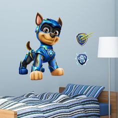 the paw patrol wall decal is shown in this child's bedroom