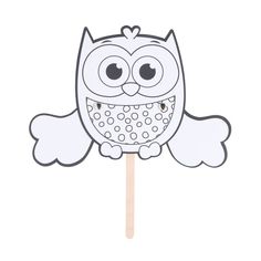 an owl shaped lollipop on a stick