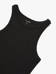 The ribbed racerback tank, made of soft-spun stretch cotton, pairs simplicity with breathability. It features a minimal Water Tower emblem for an understated style. #B1612546-900 Fabric: 100% cotton Baseball Socks, Understated Style, Water Tower, Racerback Tank, Stretch Cotton, Kids Accessories, Bag Sale, Tower, Tank Top