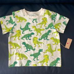 New With Tags. Size 5y Unisex Kid’s Dinosaur Themed Teeshirt By Pink Chicken New York. Style Name - Green T-Rex Made With 95% Organic Cotton & 5% Elastane. Hang To Dry Or Tumble Dry Low, Do Not Bleach, Cool Iron If Needed, Do Not Dry Clean. Dino Tshirt, Dino Shirt, Chicken Shirts, Dinosaur Kids, New York Style, T Rex, Dinosaurs, Kids Shirts, Shirts Tops