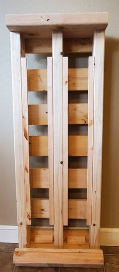 a wooden shelf sitting on top of a hard wood floor