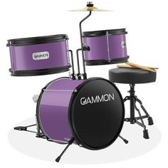 the purple drum set is ready to play