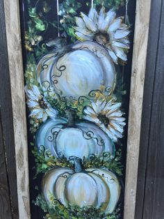 a painting of white pumpkins and daisies on a black background