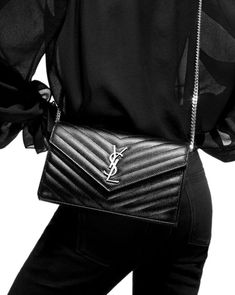 Luxury Designer Saint Laurent at Up to 70% Off Retail. Real or Your Money Back. Shop The Luxury Resale Marketplace Made by Women, for Women. Your Fave Brands Coming in Hot Daily. 1-2 times used,Like new condition, Comes with dust bag only SAINT LAURENT Medium Monogram MatelassÃ© Leather Wallet-On-Chain Embellished with an iconic insignia and punctuated with a chain strap, this chevron quilted wallet-on-chain is a timeless essential. Chain shoulder strap Snap-button flap closure Goldtone hardware Cassandre Saint Laurent, Saint Laurent Wallet On Chain, Ysl Wallet, Quilted Wallet, Saint Laurent Wallet, Wallet On Chain, Chain Wallet, Large Wallet, Monogrammed Leather