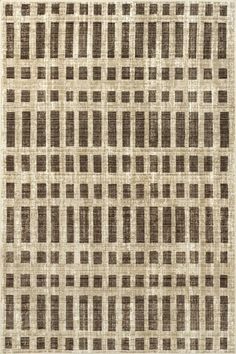 a brown and white rug with squares on it