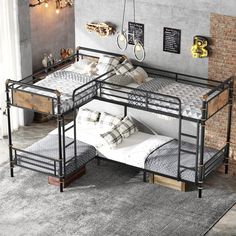 a bunk bed with two sets of mattresses on the bottom and one set of twin beds below