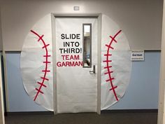 a baseball themed door with the words slide into third team garman