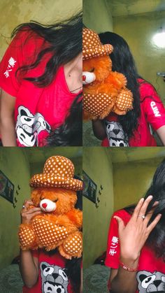 a woman holding a teddy bear in front of her face while wearing a red shirt