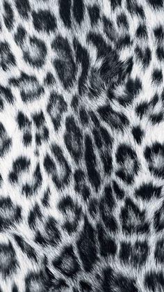 an animal print phone case with black and white fur on it's back cover